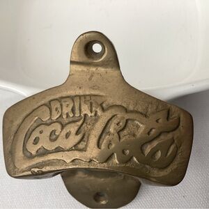 Vintage BRASS COCA COLA Wall mount bottle opener. Heavy cast, pre-owned.